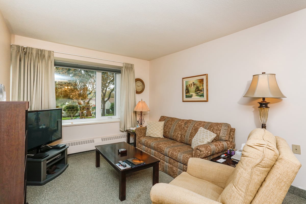 One Bedroom Suite Living Room ex 1